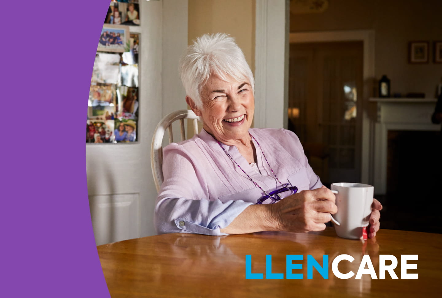 Llen at table drinking coffee