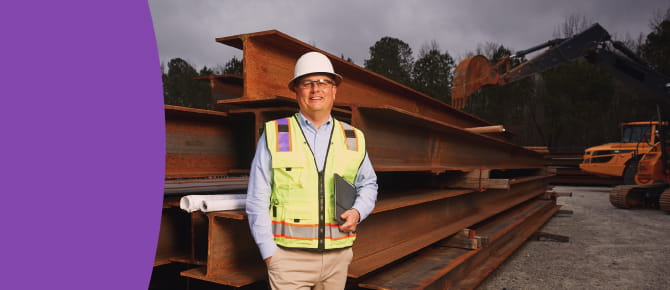 Photo of Brett at a construction site