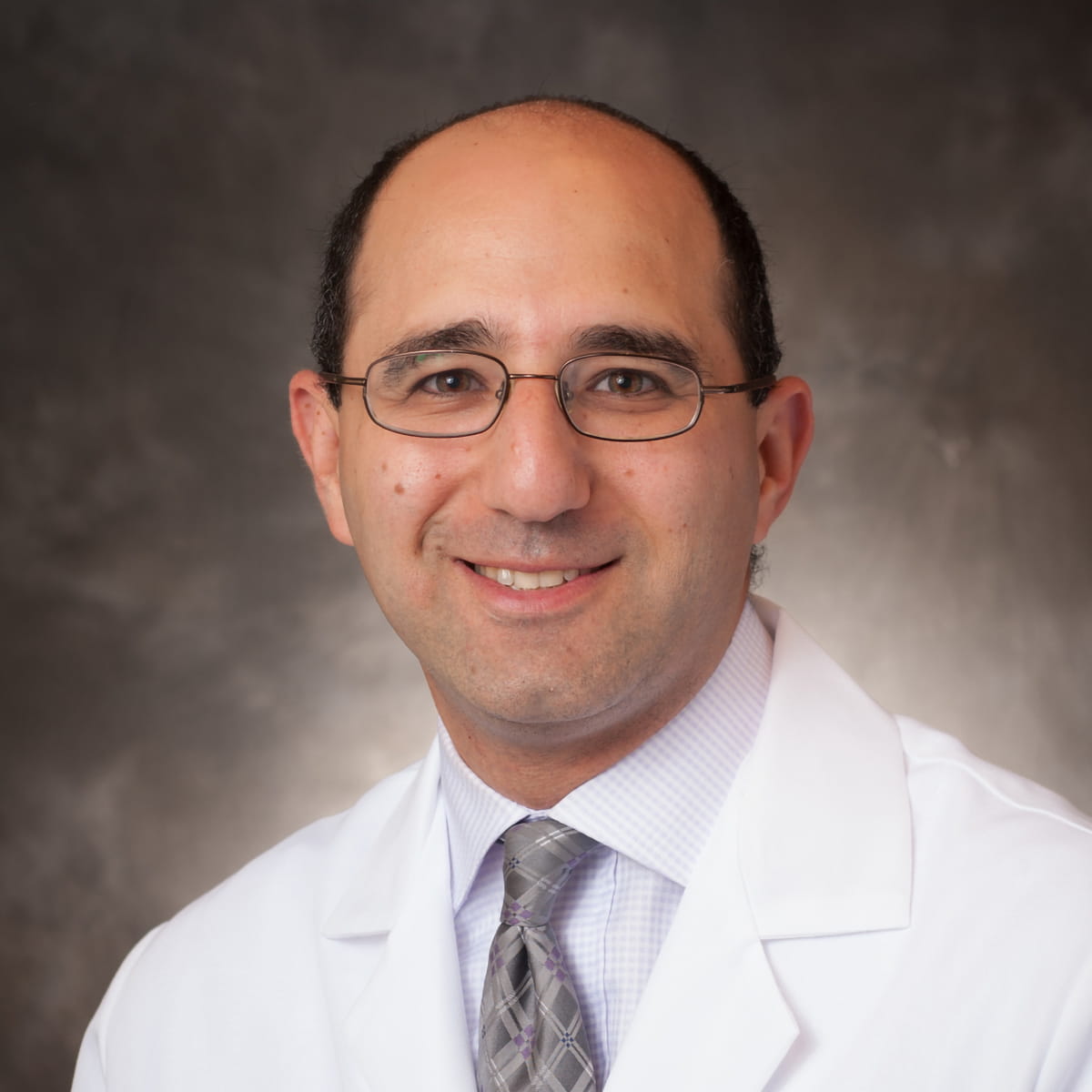 A friendly headshot of Ahmad Khaldi, MD