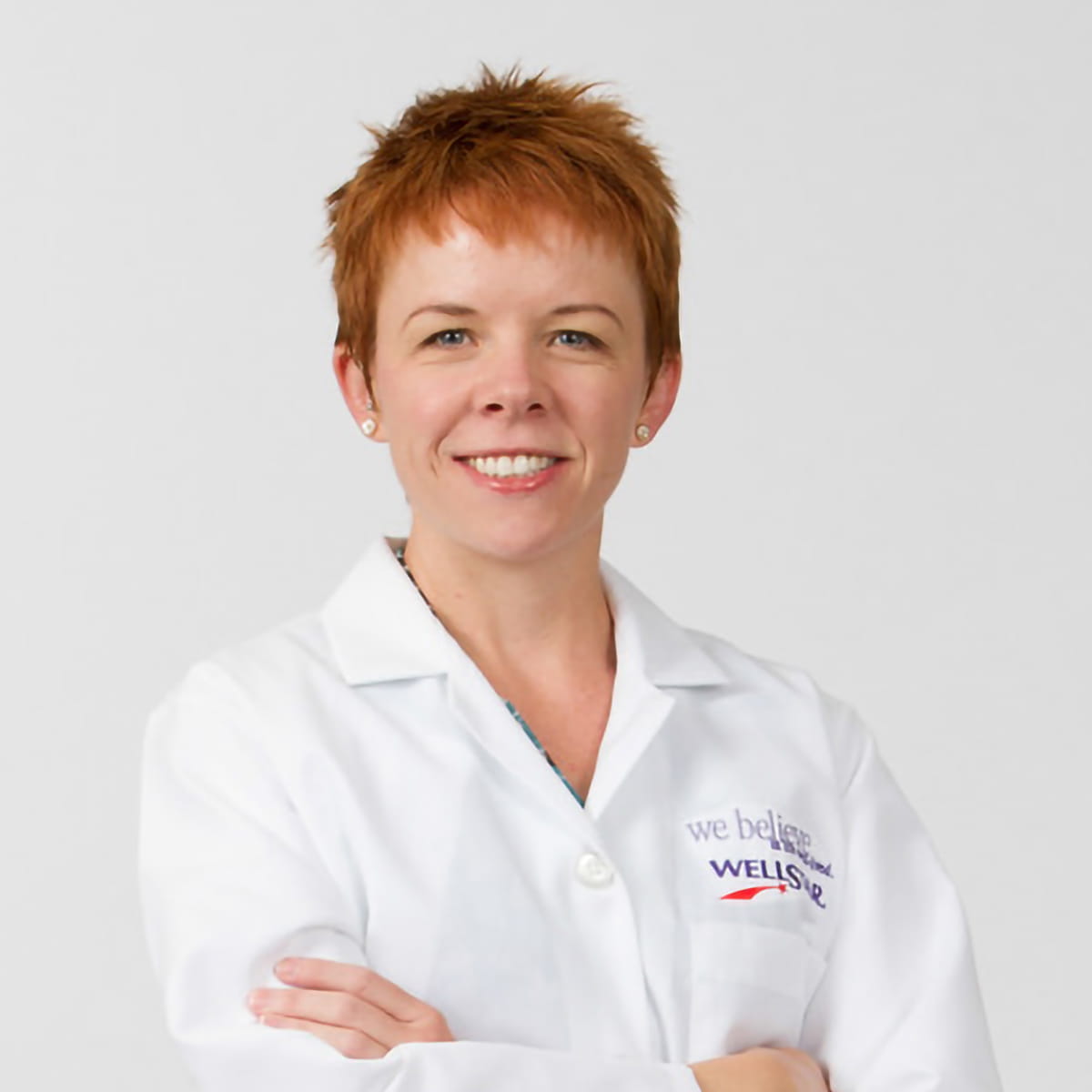 A friendly headshot of Amy Carroll, MD