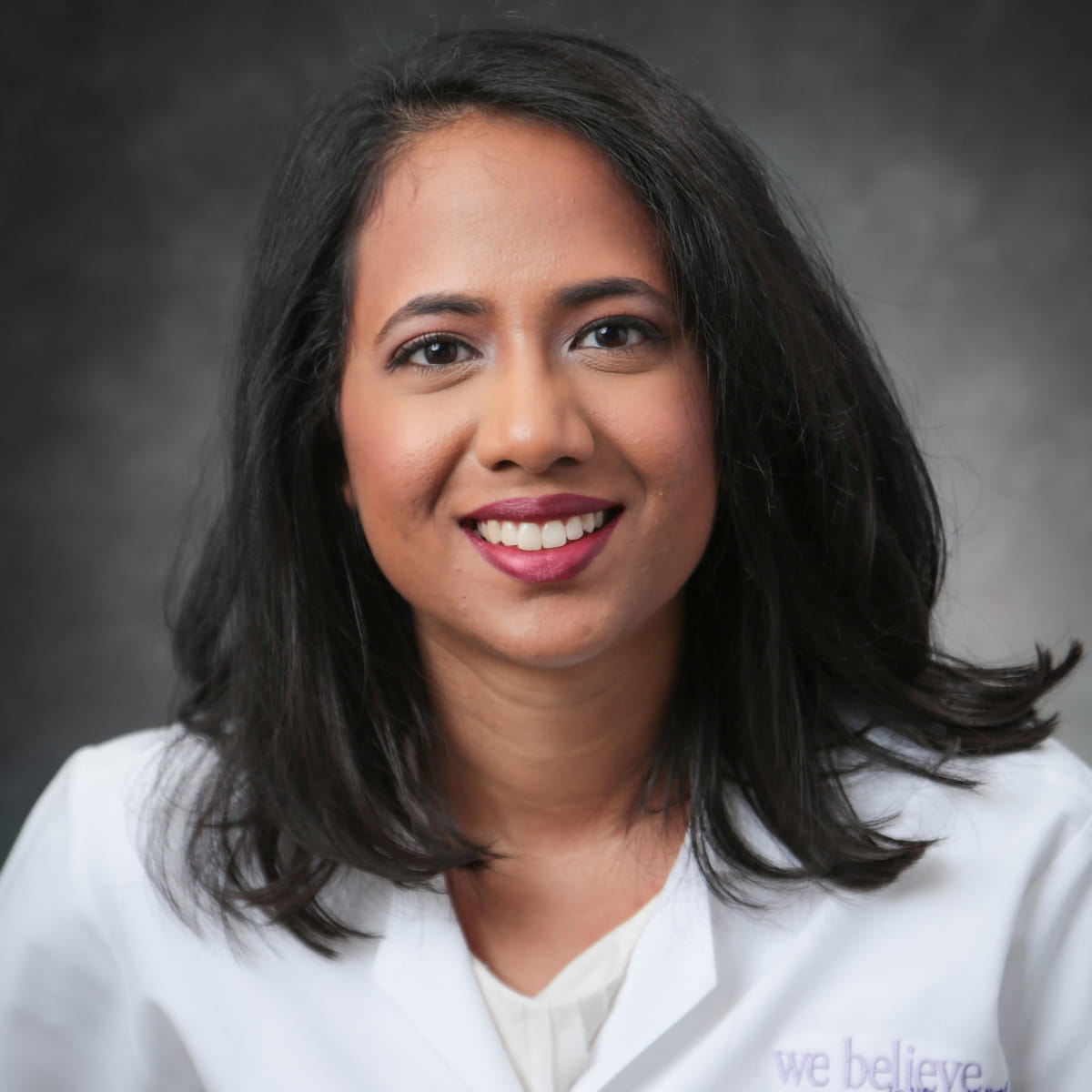 A friendly headshot of Anushka Arumugasaamy, MD