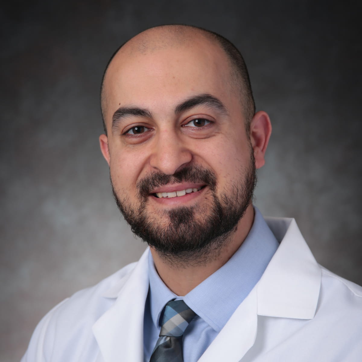 A friendly headshot of Arash Ravanmehr, MD