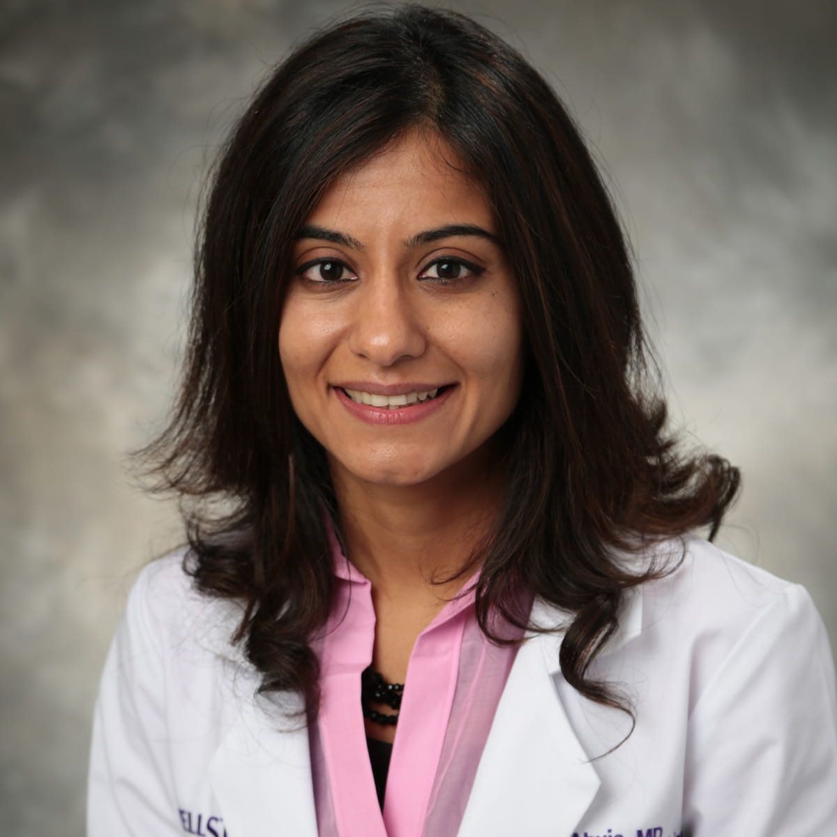 A friendly headshot of Ayushi Ahuja, MD