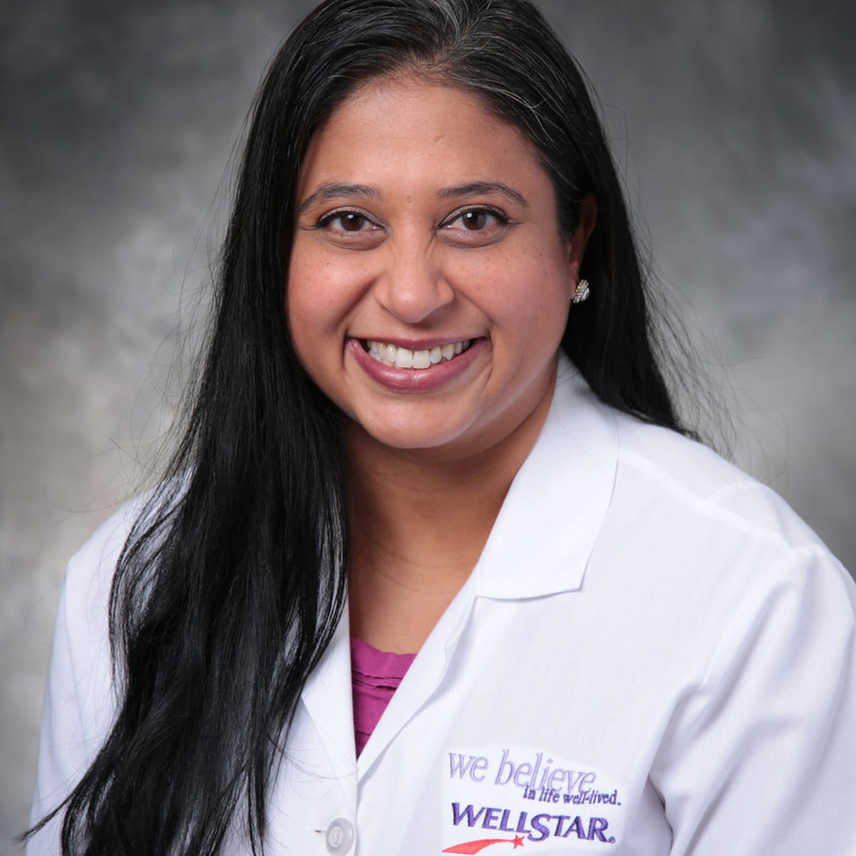 A friendly headshot of Beena Parbhu, MD