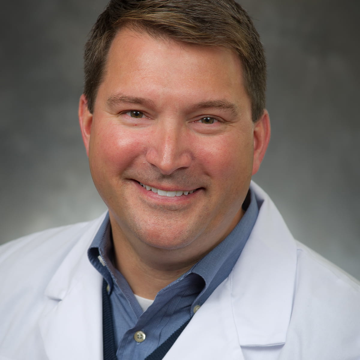 A friendly headshot of Daniel Kuzio, MD