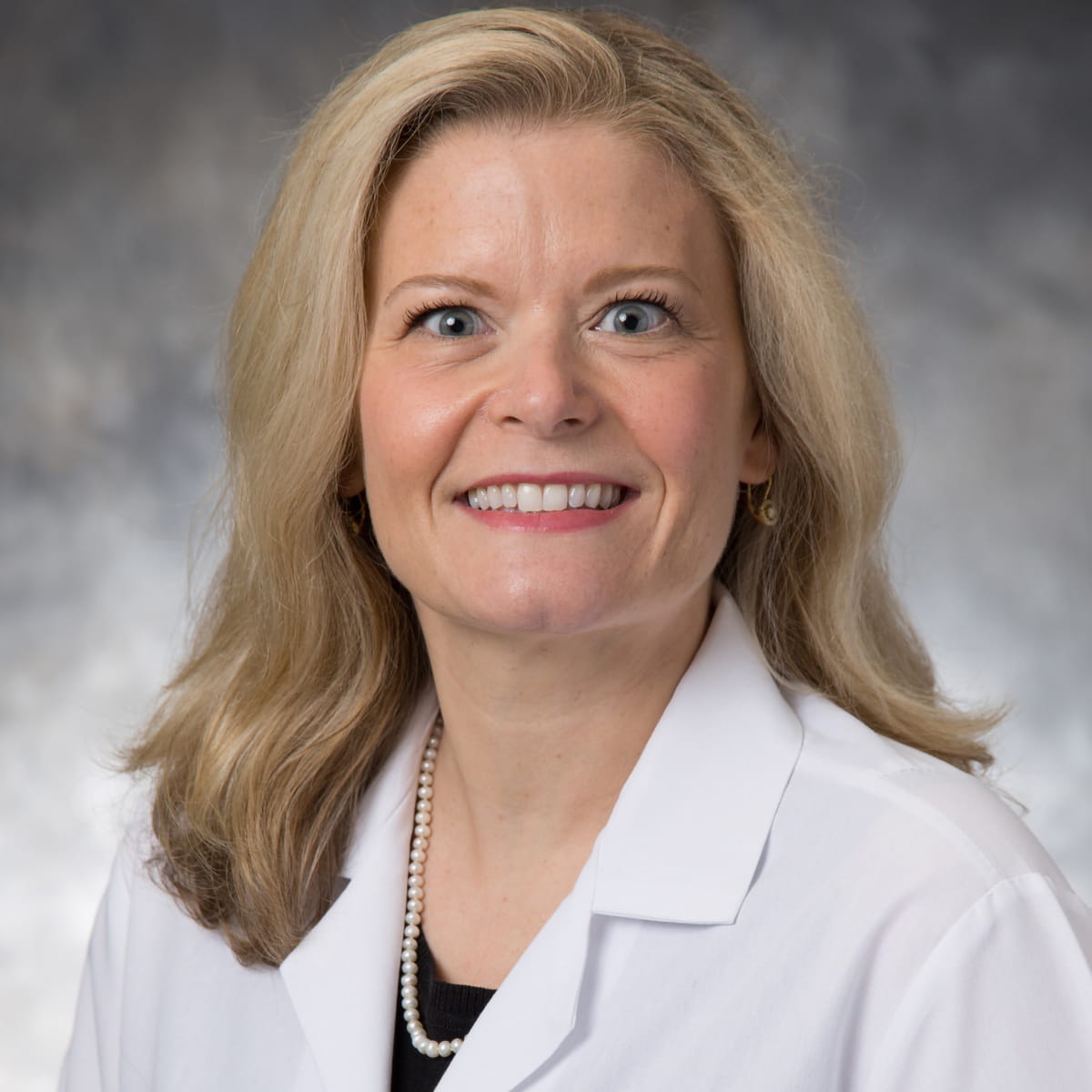 A friendly headshot of Laura Pearson, MD