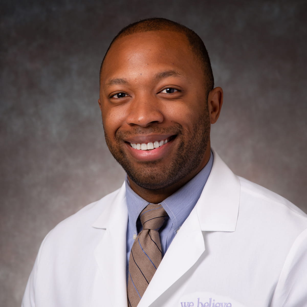 A friendly headshot of Marcus Gates, MD