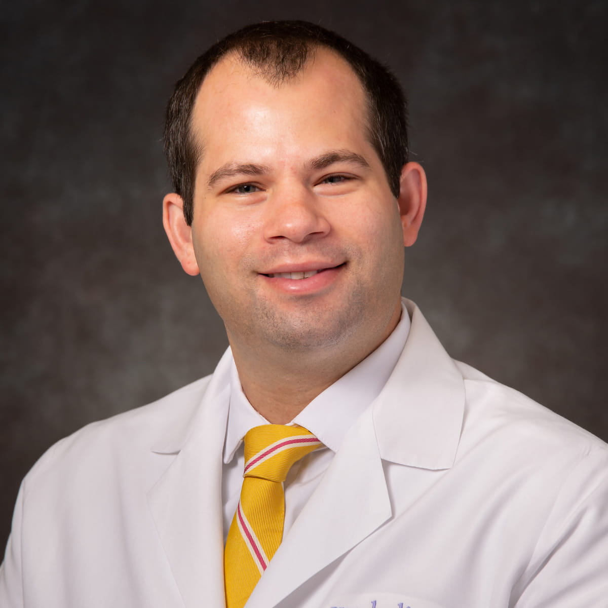 A friendly headshot of Michael Kaufman, MD