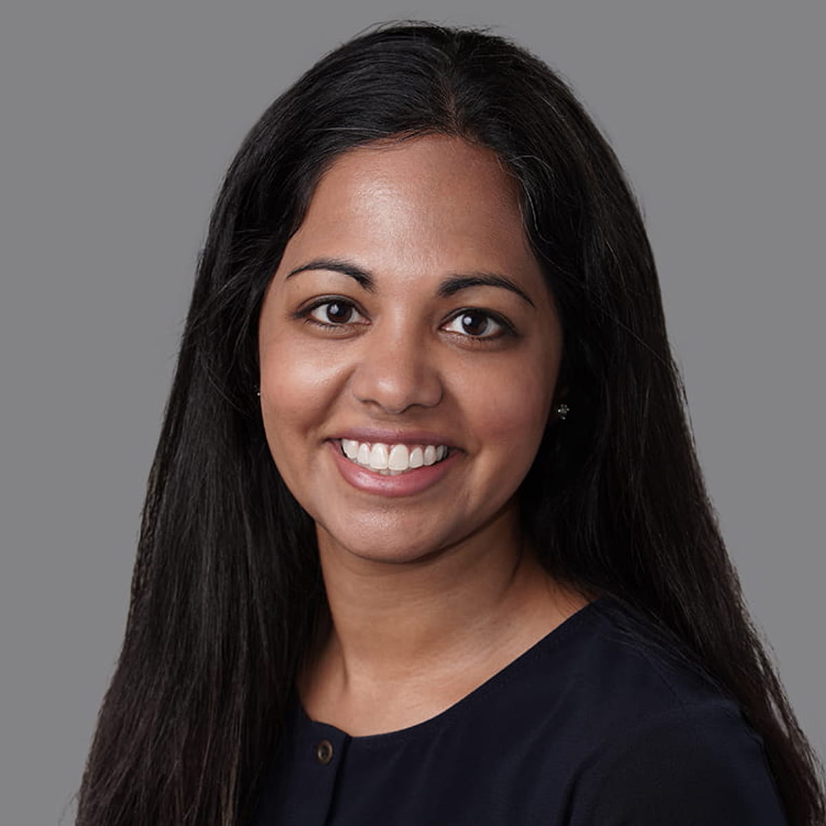 A friendly headshot of Nidhi Huff, MD