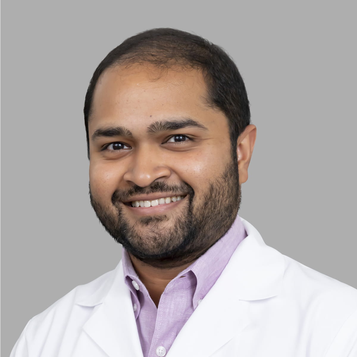 A friendly headshot of Nikhil Kadle, MD