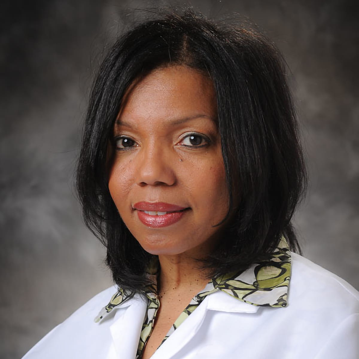 A friendly headshot of Paula Greaves, MD