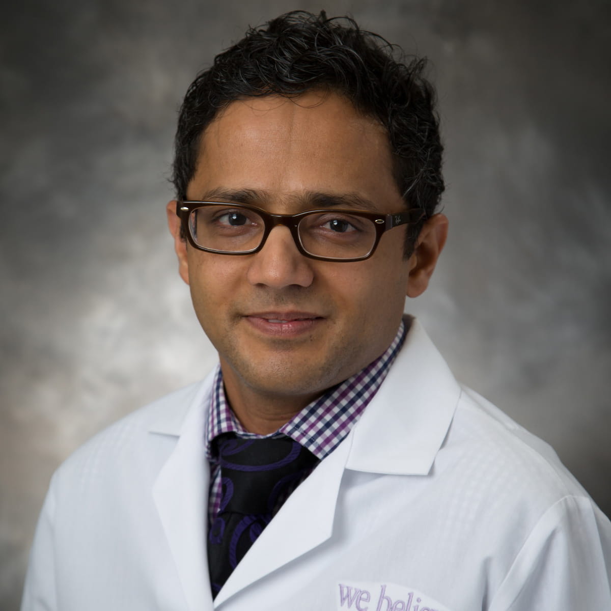 A friendly headshot of Samish Dhungana, MD