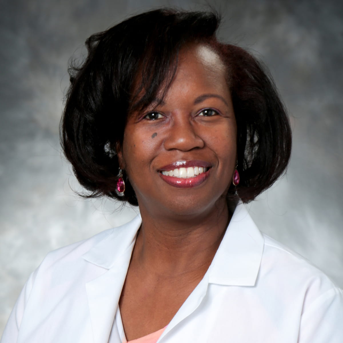 A friendly headshot of Tangela Atkinson, MD