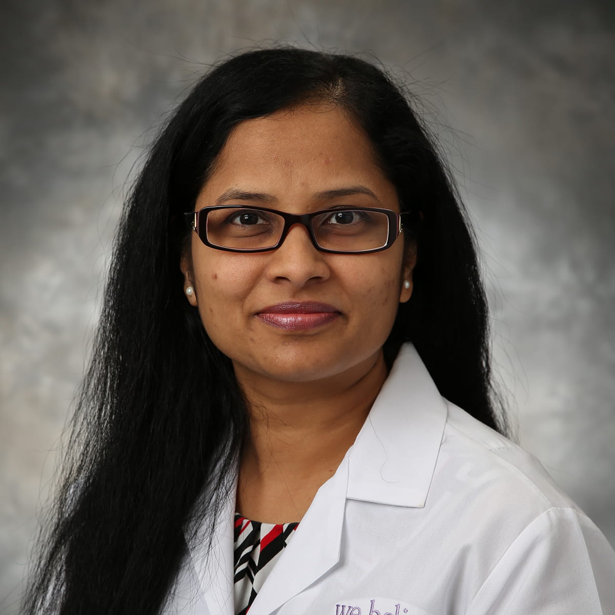 A friendly headshot of Veena Malepati, MD