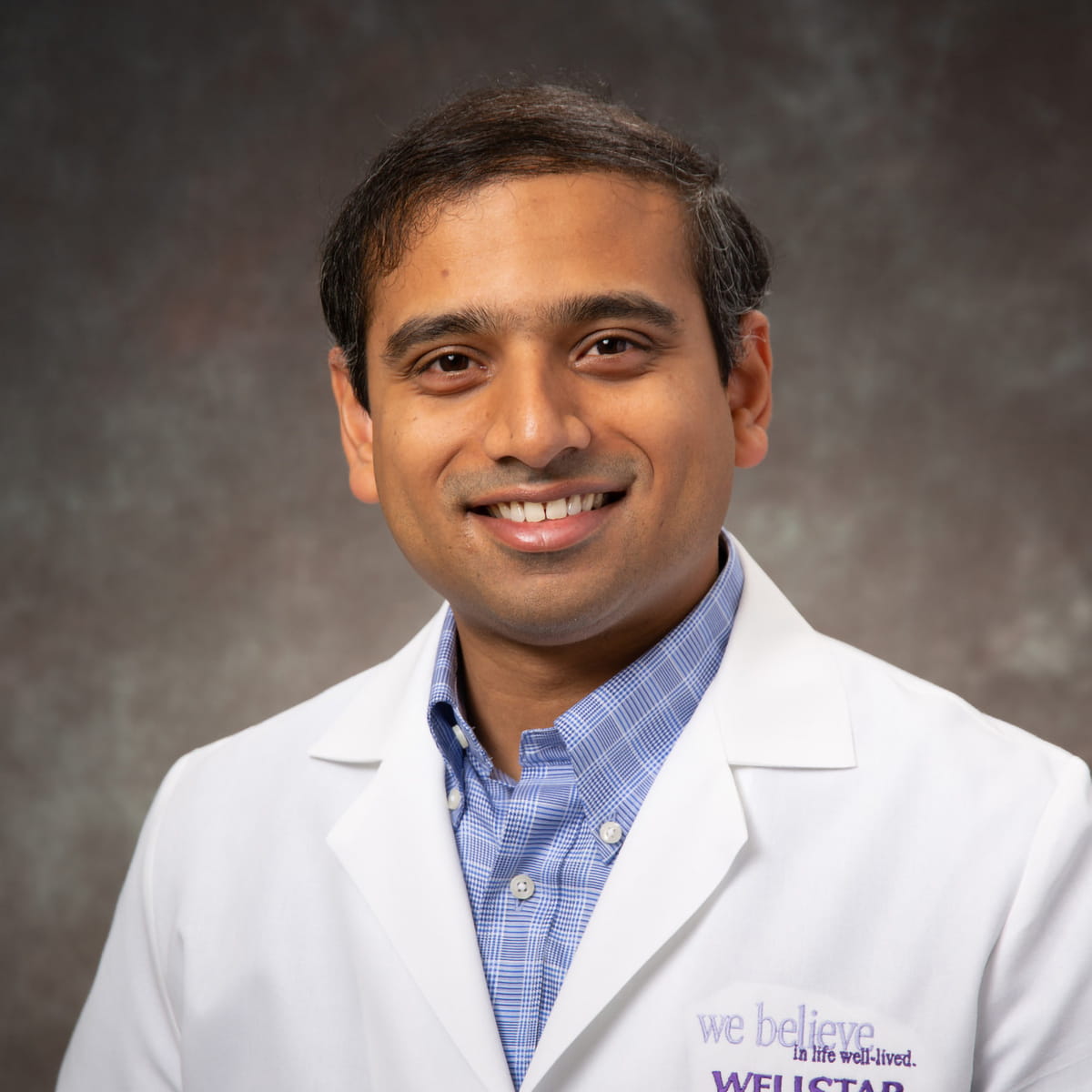 A friendly headshot of Vineet Reddy, MD