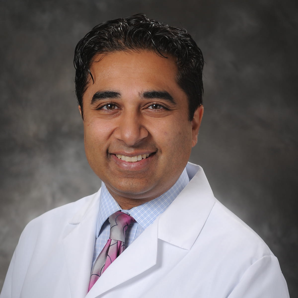 A friendly headshot of Vivek Gupta, MD